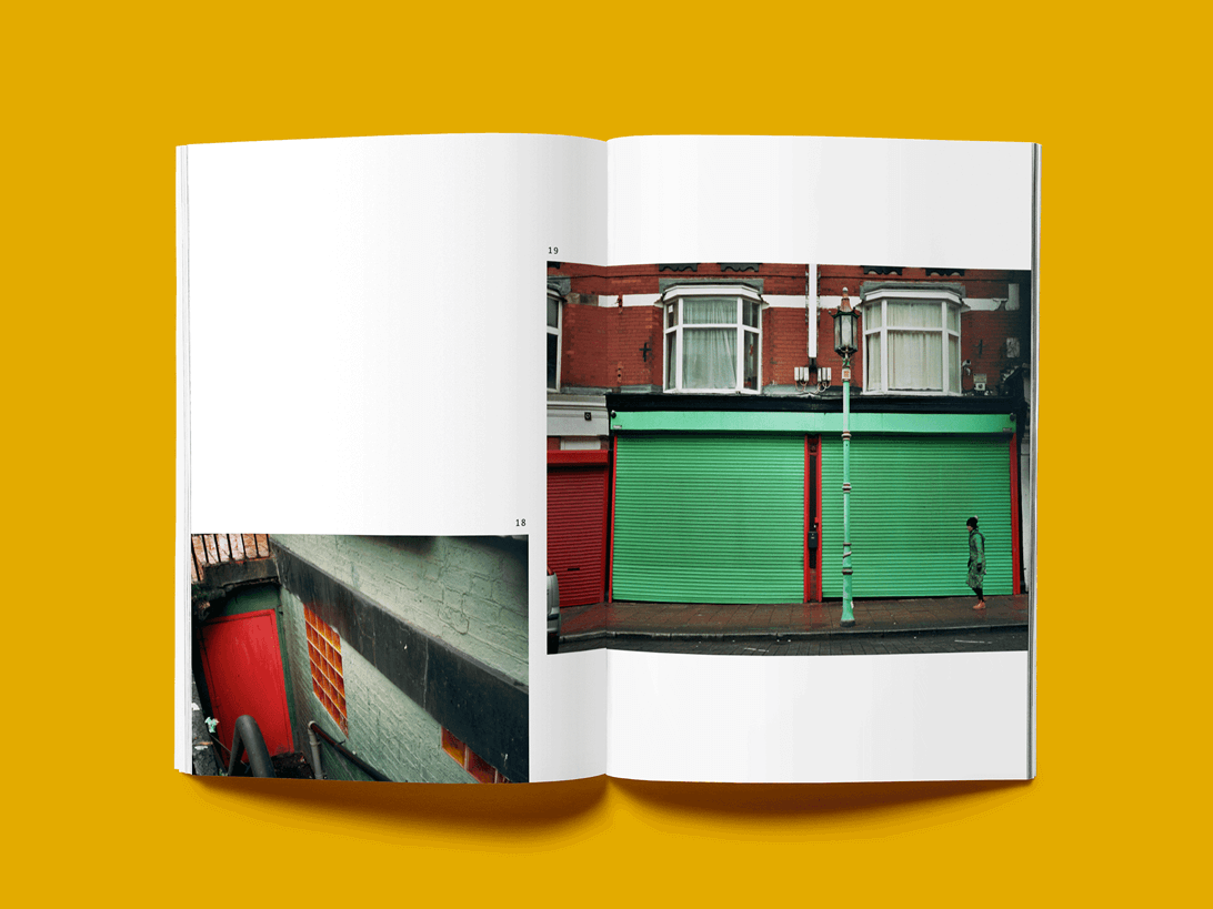 mock-up of publication spread featuring photographs of Liverpool