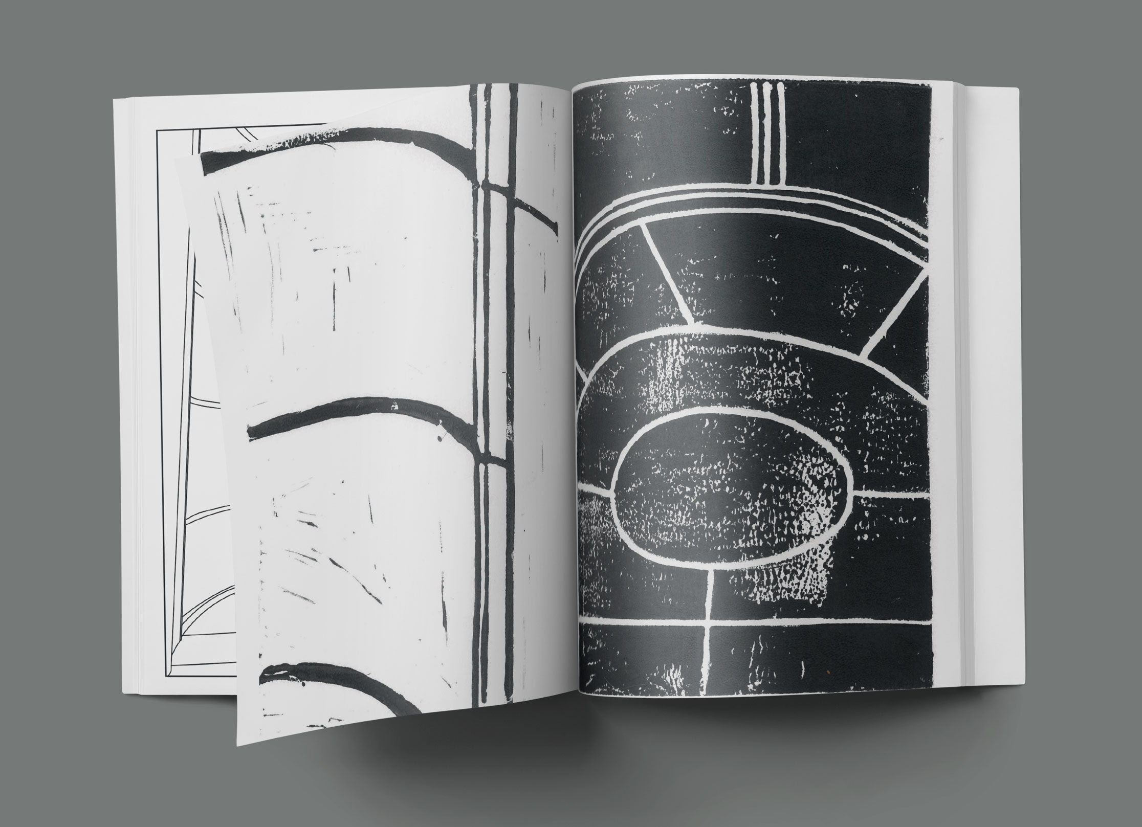 Mock-up of publication, showing spread artwork, architectural line drawing