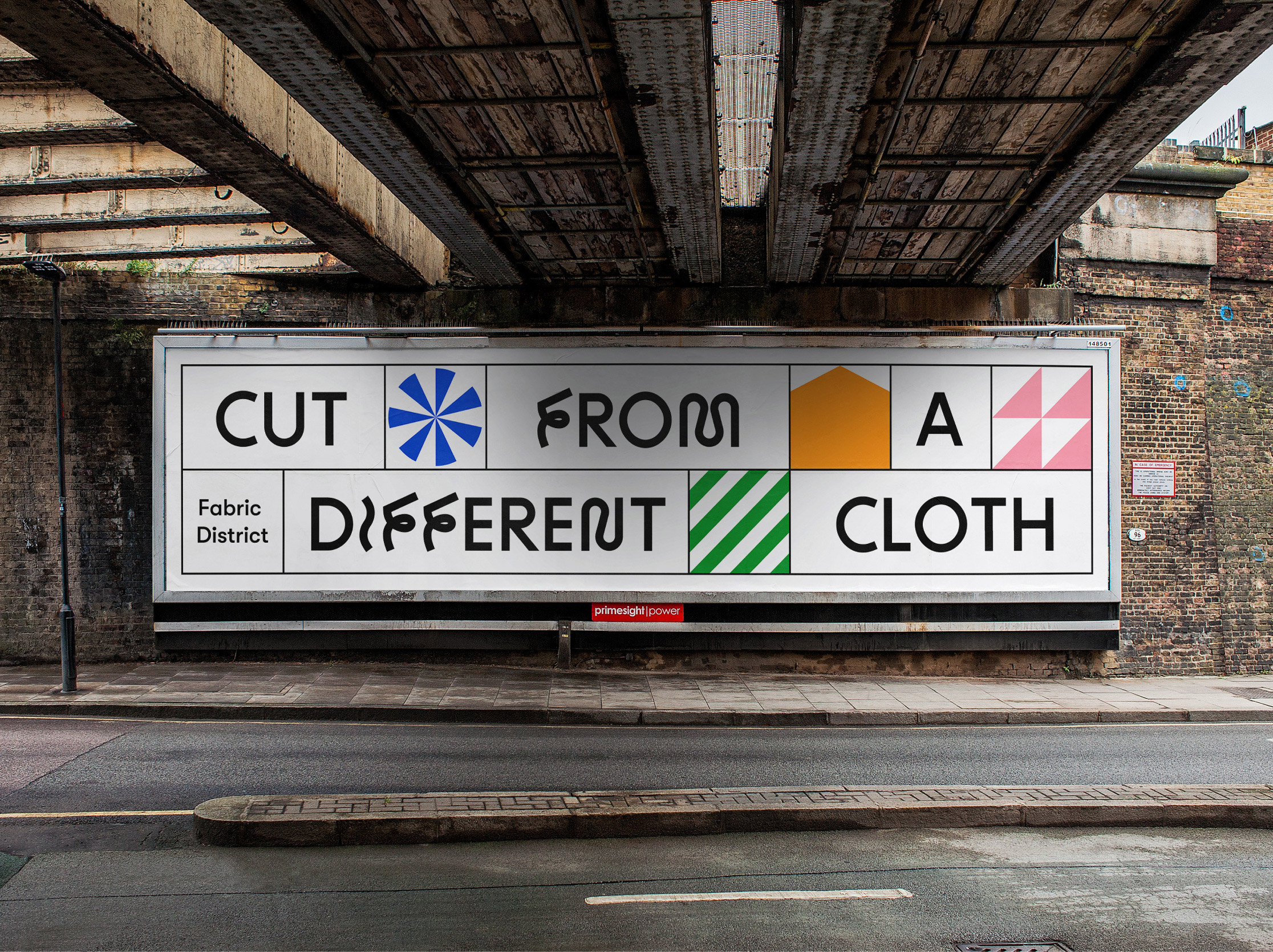 Mock-up photograph, billboard featuring brand communication typography, Cut From A Different Cloth
